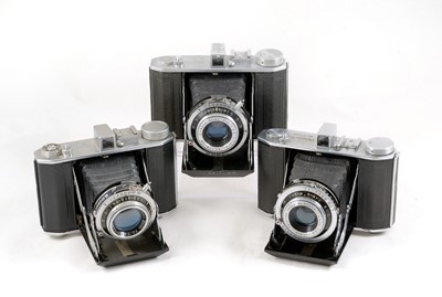 Lot 210 - Three Olympus Six Medium Format Folding Cameras.