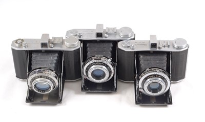 Lot 210 - Three Olympus Six Medium Format Folding Cameras.