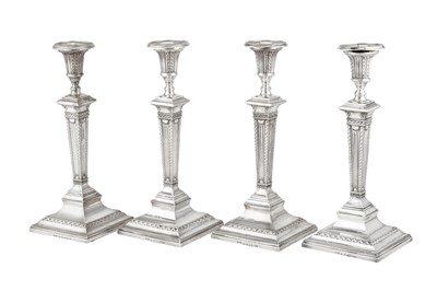 Lot 501 - A set of four George III sterling silver candlesticks, Sheffield 1788 by Samuel Roberts and Co (probably), retailed by Henry Green of London