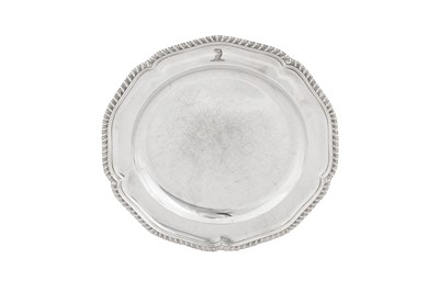 Lot 473 - A George III sterling silver dinner plate, London 1767 by James and Sebastian Crespell