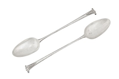Lot 311 - A pair of George III sterling silver basting spoons, London 1780 maker’s mark obscured