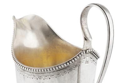 Lot 430 - A George III Irish provincial silver milk jug, Cork circa 1785 by John Hillery (1750-1780) or John Humphreys (1773-87)