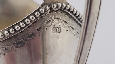 Lot 430 - A George III Irish provincial silver milk jug, Cork circa 1785 by John Hillery (1750-1780) or John Humphreys (1773-87)