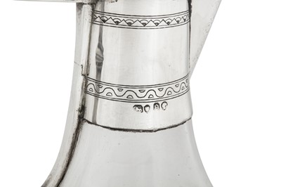 Lot 400 - A Victorian sterling silver and enamel mounted glass ecclesiastical flagon or ewer, London 1869 by Charles Hart (reg. 3rd August 1857) of Hart, Son, Peard and Co