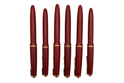 Lot 94 - A GROUP OF SIX RED PARKER FOUNTAIN PENS