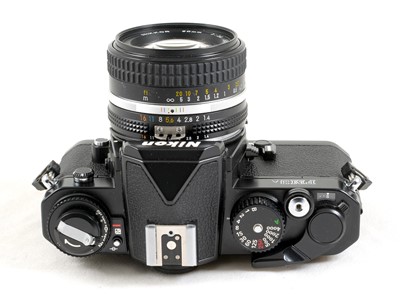 Lot 176 - A Black Nikon FM3A Body with 50mm f1.4 Lens.