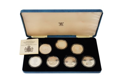 Lot 91 - A SET OF 7 PROOF COMMEMORATIVE CROWN COINS MARKING THE 80TH BIRTDAY OF ELIZABETH THE QUEEN MOTHER
