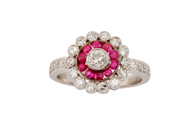 Lot 193 - A RUBY AND DIAMOND CLUSTER RING