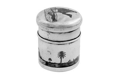 Lot 234 - An early 20th century Iraqi silver and niello jar or tea caddy, circa 1930 signed Omara Salih