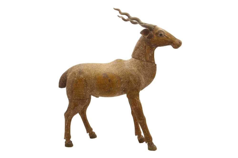 Lot 299 - AN INDIAN-CARVED WOODEN SCULPTURE OF A DEER