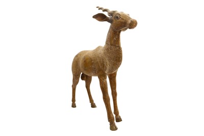 Lot 299 - AN INDIAN-CARVED WOODEN SCULPTURE OF A DEER