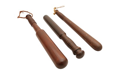 Lot 148 - A GROUP OF THREE WOODEN POLICE TRUNCHEONS