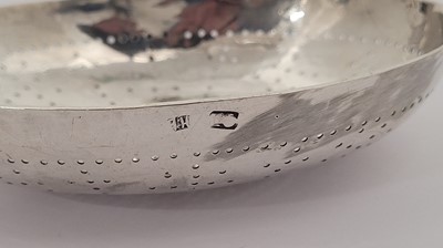 Lot 449 - A George III provincial sterling silver ‘West Country’ lemon strainer Exeter circa 1770 by Jason Holt of Plymouth