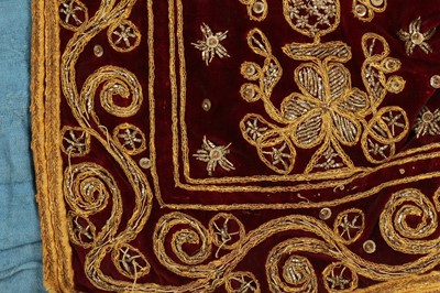 Lot 361 - A ZARDOZI-EMBROIDERED PLUM VELVET LIVERY