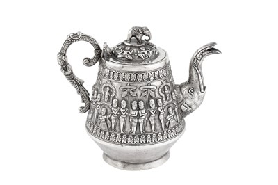 Lot 258 - AN ANGLO-INDIAN UNMARKED SILVER TEAPOT