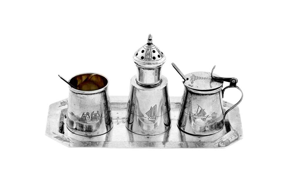 Lot 231 - A mid-20th century Iraqi silver cruet set on tray, Omara or Basra circa 1950