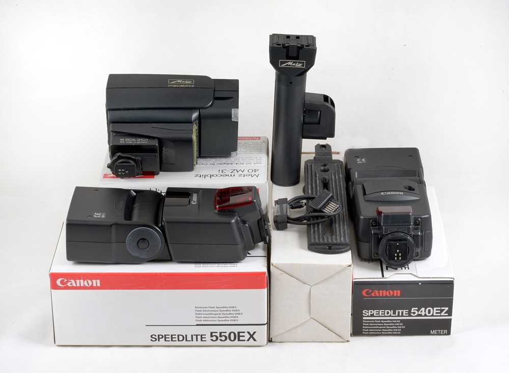 Flash Unit Boxes Lot 192 - A Group of Canon Flash Units for Canon EOS