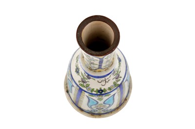 Lot 136 - A POLYCHROME-PAINTED POTTERY WATER PIPE (QALYAN) BOTTLE