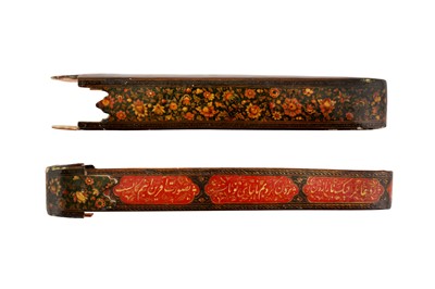 Lot 151 - TWO LACQUERED PAPIER-MÂCHÉ PEN CASES (QALAMDAN) WITH WINGED ANGELS AND QAJAR MAIDENS