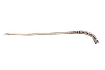Lot 454 - A DIAMOND-SET PARCEL-GILT MAKARA HAIRPIN