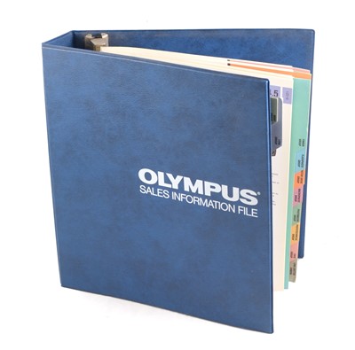 Lot 446 - An Olympus Sales Information File.