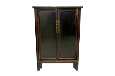 Lot 206 - A CHINESE BLACK LACQUERED PINE CABINET, EARLY 20TH CENTURY