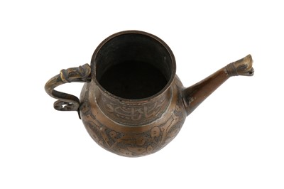 Lot 130 - A SMALL INCISED TINNED COPPER TIMURID JUG WITH A DRAGON HANDLE AND SPOUT