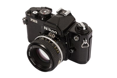 Lot 175 - A Nikon FM2N SLR Camera Outfit