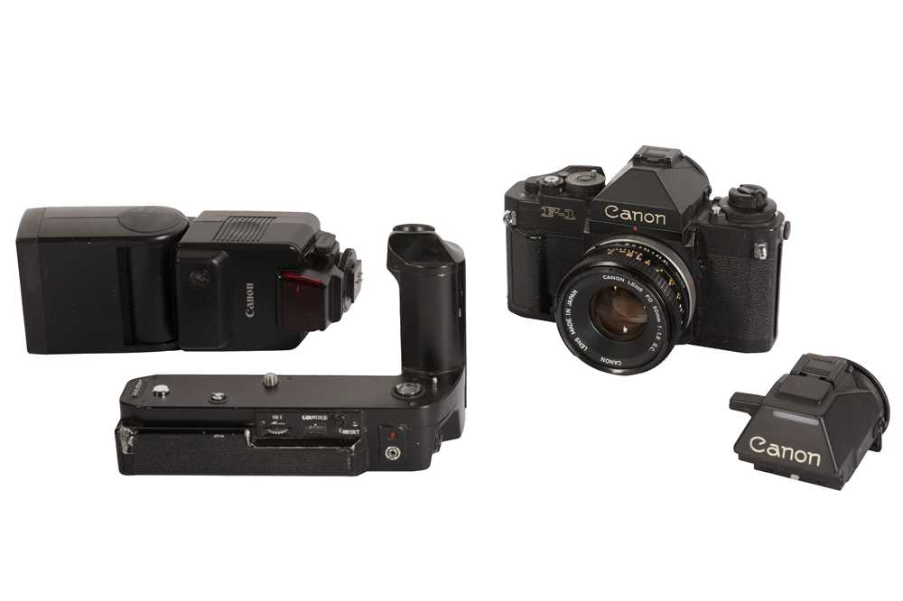 Lot 190 - A Canon F1 SLR Camera Outfit