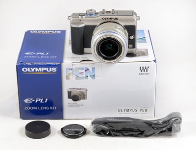 Lot 24 - Chrome Olympus Pen E-PL1 Zoom Lens Kit.