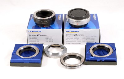 Lot 5 - A Selection of Adapters for using OM Lenses on Digital Cameras.