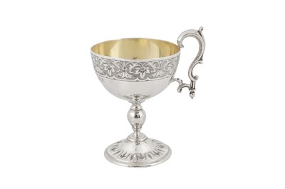 Lot 381 - A Victorian sterling silver christening mug, London 1869 by messrs Barnard
