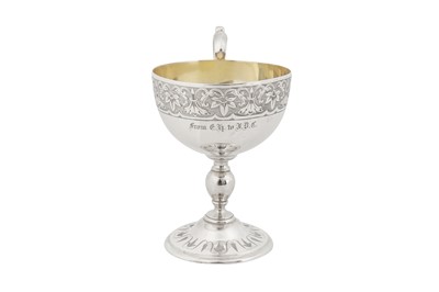 Lot 381 - A Victorian sterling silver christening mug, London 1869 by messrs Barnard