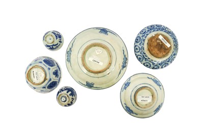 Lot 38 - SIX CHINESE-INSPIRED BLUE AND WHITE POTTERY VESSELS