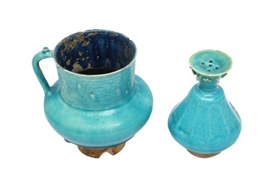 Lot 8 - A KASHAN TURQUOISE-GLAZED POTTERY JUG AND SPRINKLER