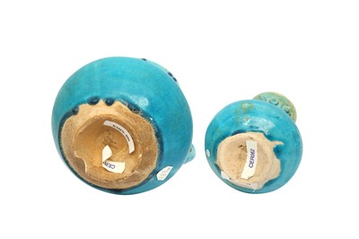 Lot 8 - A KASHAN TURQUOISE-GLAZED POTTERY JUG AND SPRINKLER
