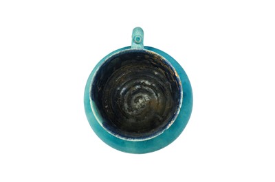 Lot 8 - A KASHAN TURQUOISE-GLAZED POTTERY JUG AND SPRINKLER