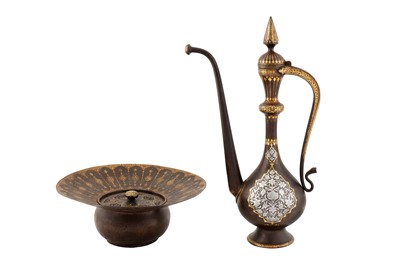 Lot 18 - A FINE QAJAR SILVER-OVERLAID GOLD-DAMASCENED STEEL EWER AND A STEEL BASIN WITH OPENWORK COVER