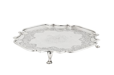 Lot 441 - A George II Scottish silver kettle stand or salver, Edinburgh 1744 by James Weems