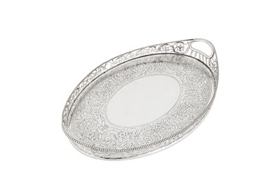 Lot 376 - A small Victorian sterling silver twin handled tray, London 1901 by Charles Stuart Harris