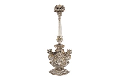 Lot 257 - A PARCEL-GILT SILVER REPOUSSÉ ROSEWATER SPRINKLER (GULABPASH) WITH WINGED LIONS