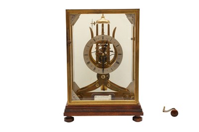 Lot 432 - A CASED SKELETON CLOCK