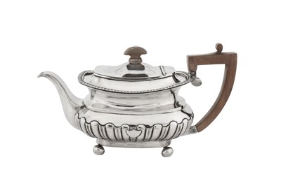 Lot 193 - An early 19th century Chinese Export silver bachelor teapot, Canton circa 1830 mark of WE WE WC
