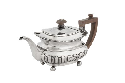 Lot 193 - An early 19th century Chinese Export silver bachelor teapot, Canton circa 1830 mark of WE WE WC