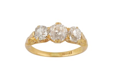 Lot 142 - A three-stone diamond ring