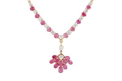 Lot 18 - A ruby and diamond pendant necklace