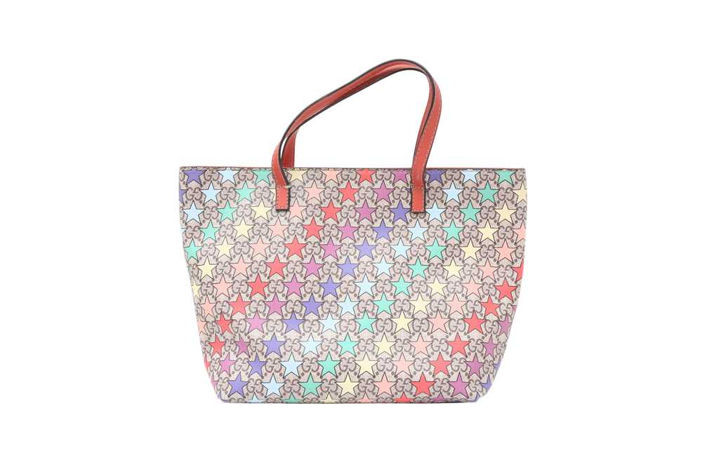 Lot 60 - Gucci Beige GG Supreme Stars Print Mini Tote