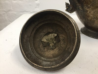 Lot 361 - A TIBETAN BRONZE EWER AND COVER