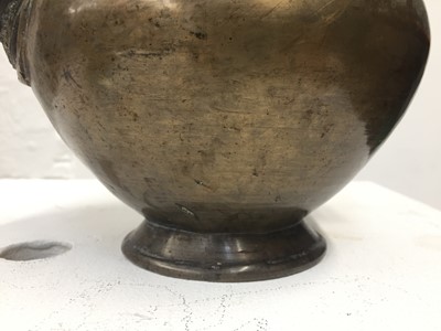 Lot 361 - A TIBETAN BRONZE EWER AND COVER