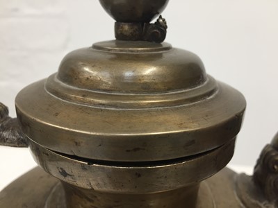 Lot 361 - A TIBETAN BRONZE EWER AND COVER